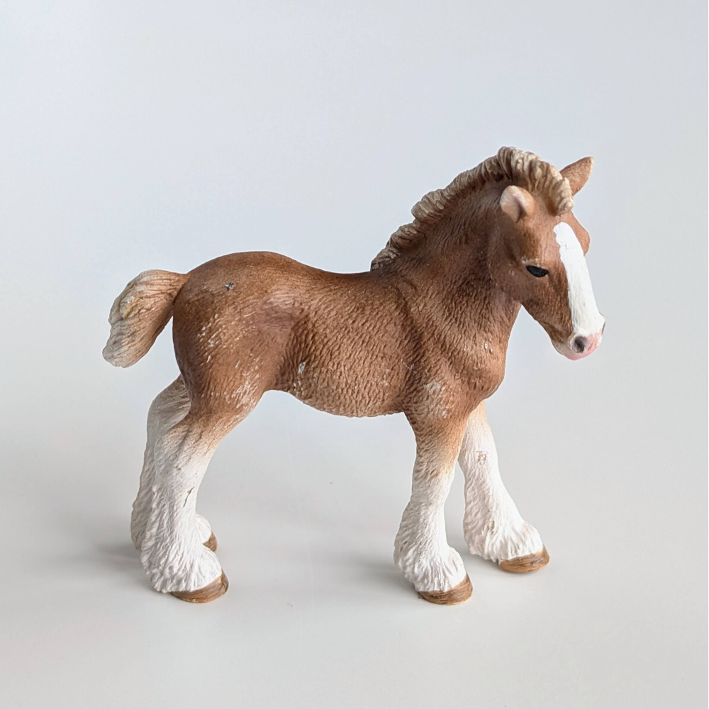 Б.в. Лоша Клейдесдальське Schleich 13671